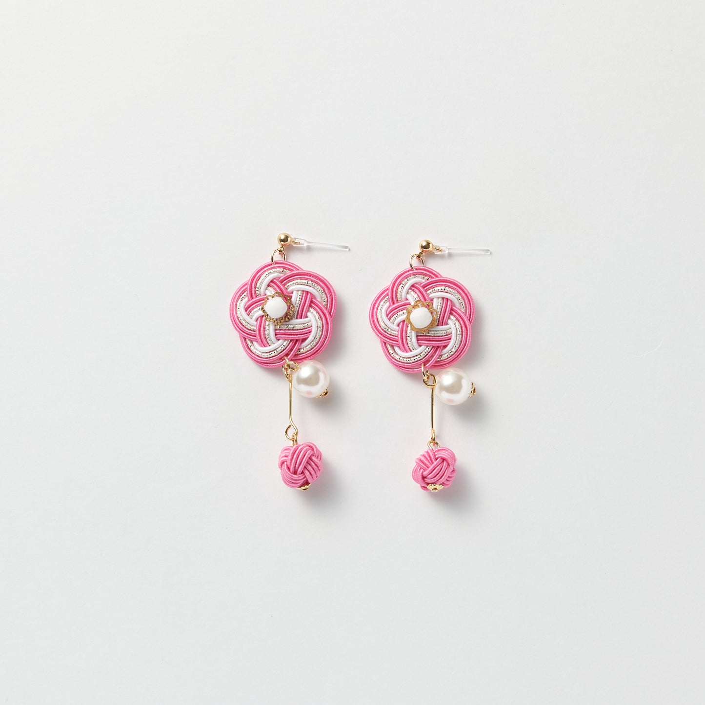 Handcrafted silk-wrapped mizuhiki earrings in traditional Japanese knot design - light pink color