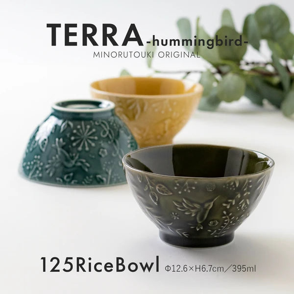 TERRA Hummingbird rice bowl in Labrador Blue displayed with other tableware pieces