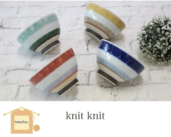 Set of four Hasami Ware bowls with knit-inspired texture and striped design in warm tones