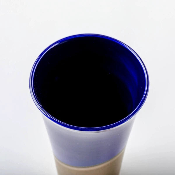 Top view of porcelain tumbler showing deep blue glaze