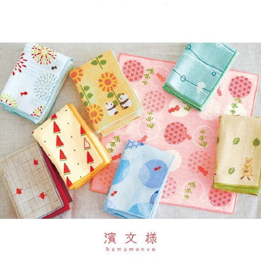 Folded Hamamonyo towels in assorted Japanese patterns for everyday or decorative use