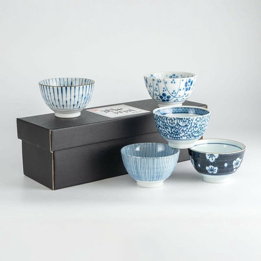 Set of five Mino Ware porcelain sencha cups, each with a unique design