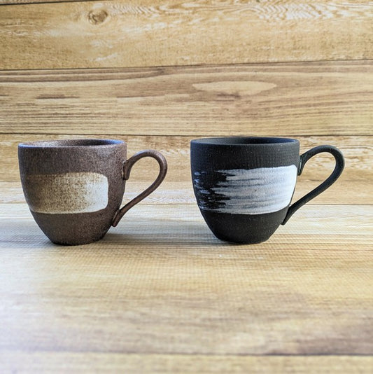 Close-up showing unique brush-applied Hakeme texture on ceramic cup surface