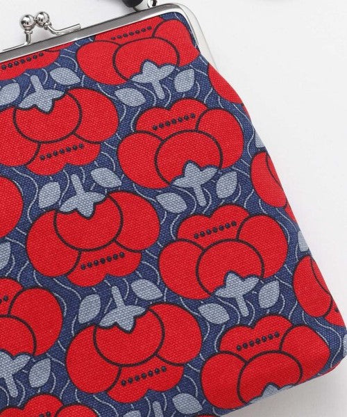 Close-up of metal clasp frame and durable cotton fabric on gamaguchi bag