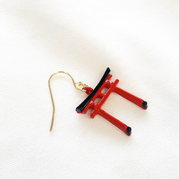 Front side of Japanese torii gate earrings highlighting layered resin design