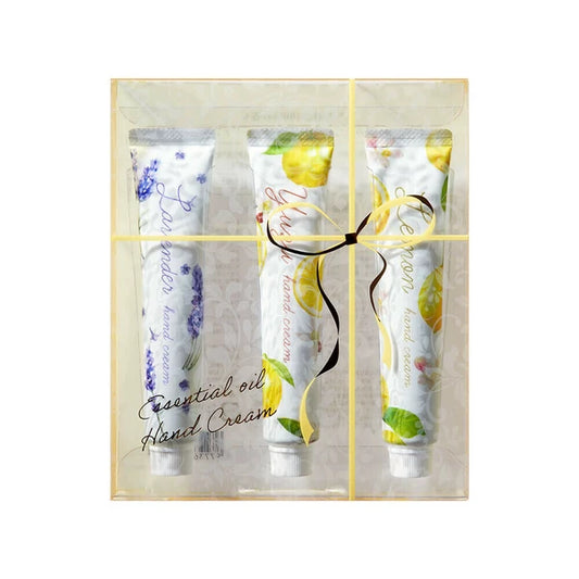 Three tubes of essential oil hand cream in gift-ready packaging