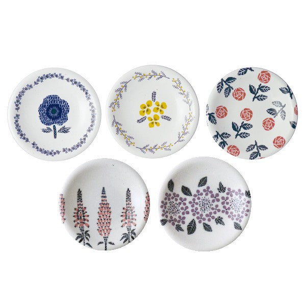 Set of five BOUQUETS series small plates in blue, red, and yellow floral patterns, inspired by colorful flower bouquets.