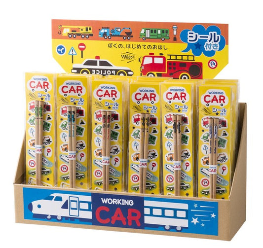 Display of Japanese kids’ chopsticks with vehicle designs including Shinkansen, fire truck, police car, and bus
