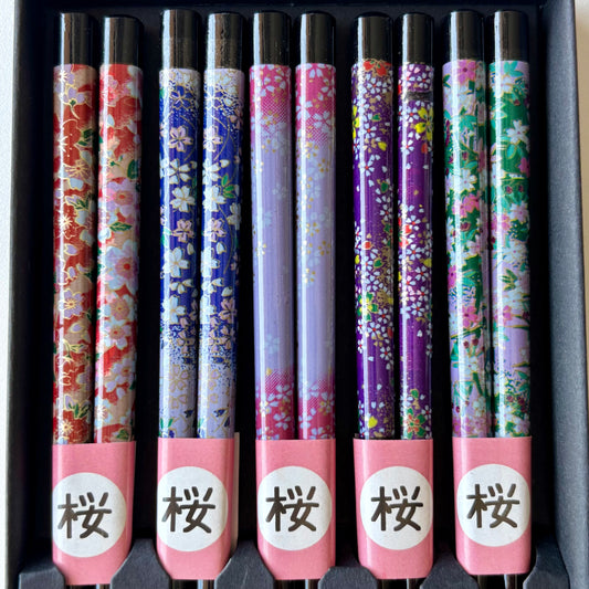 Close-up of floral sakura patterns on Japanese chopsticks