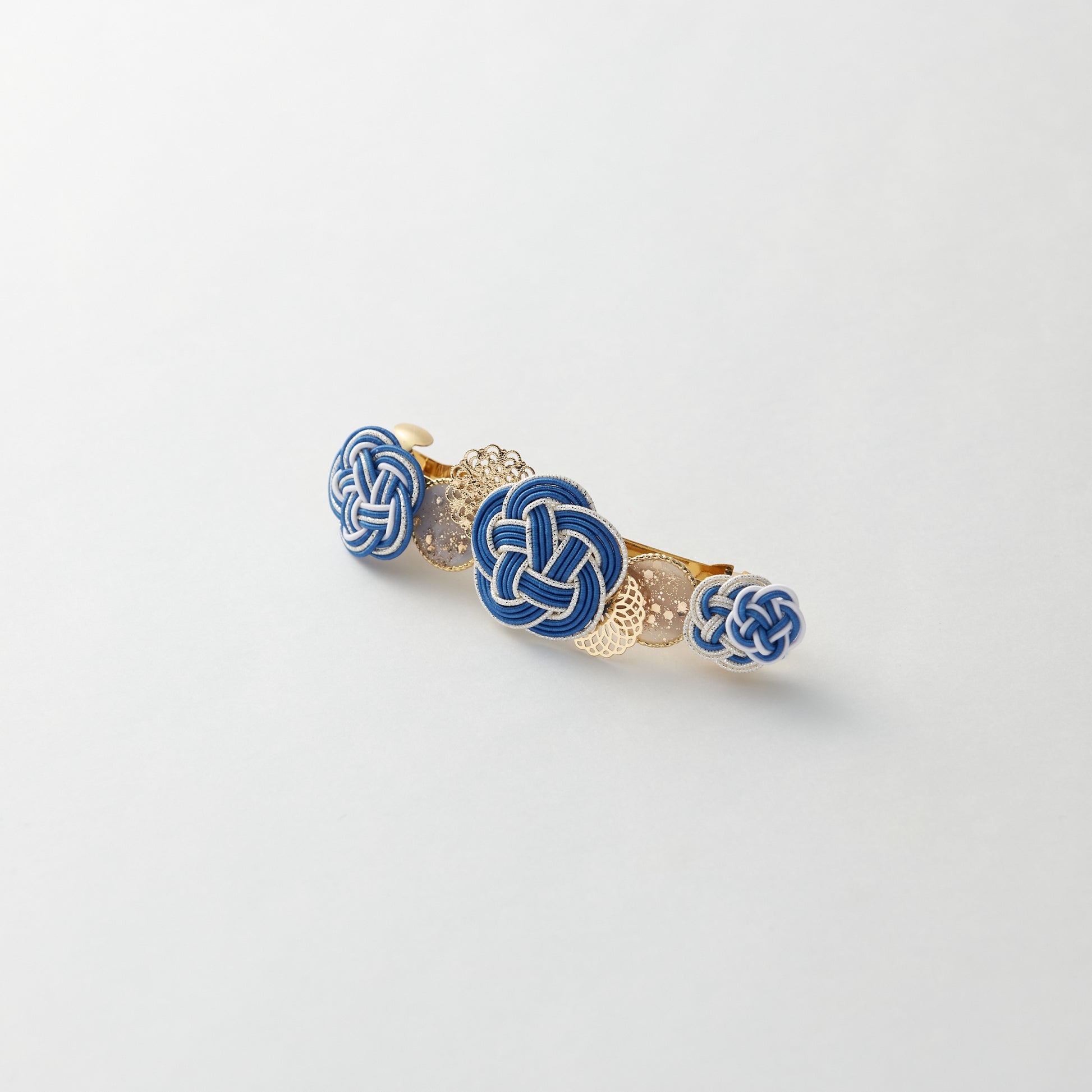 Japanese mizuhiki barrette with plum blossom design in blue