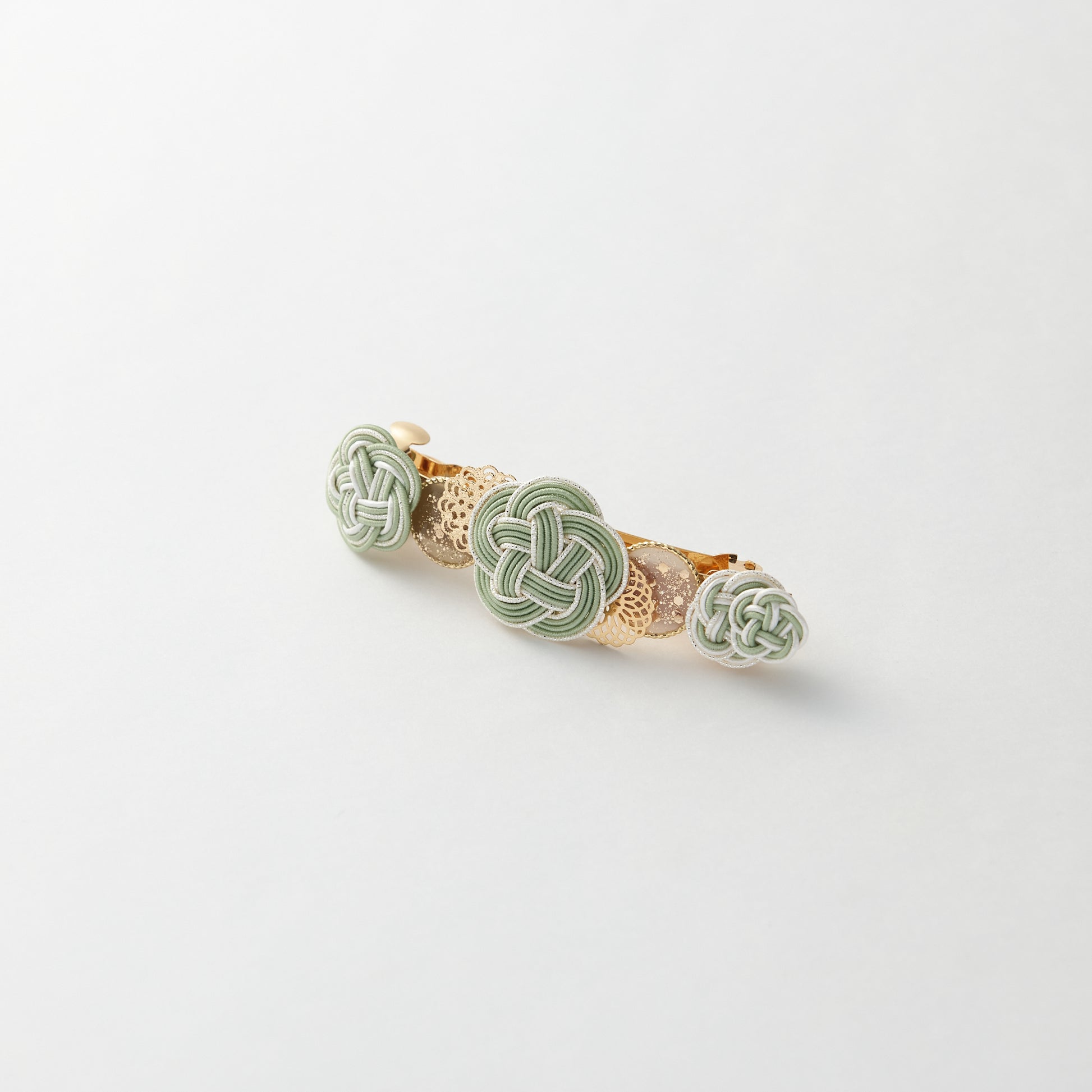 Japanese mizuhiki barrette with plum blossom design in green