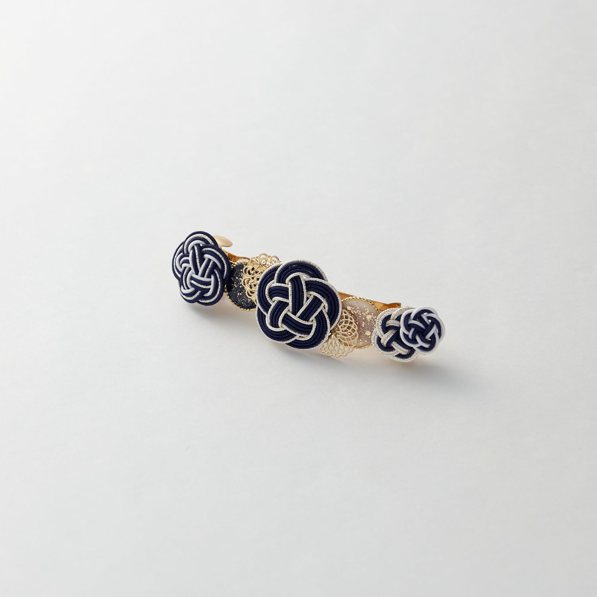 Japanese mizuhiki barrette with plum blossom design in navy