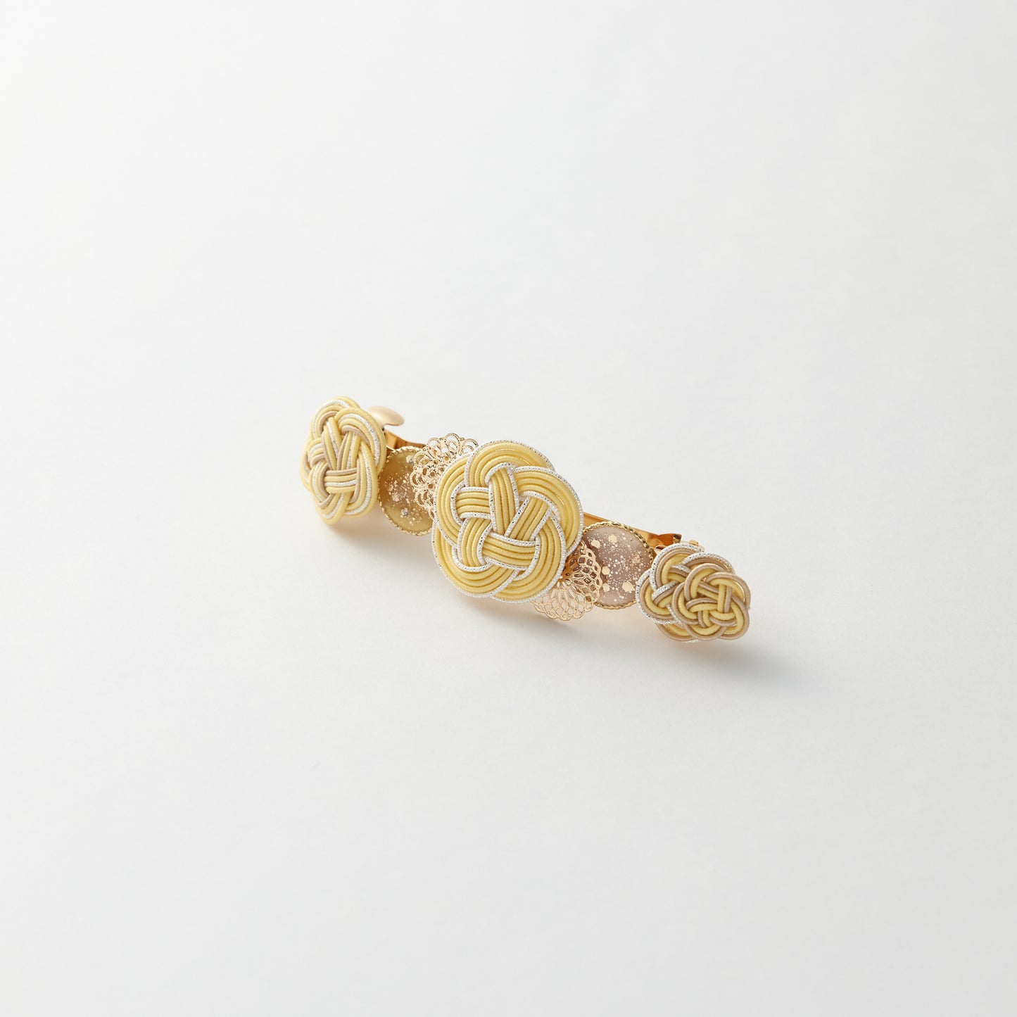 Japanese mizuhiki barrette with plum blossom design in yellow