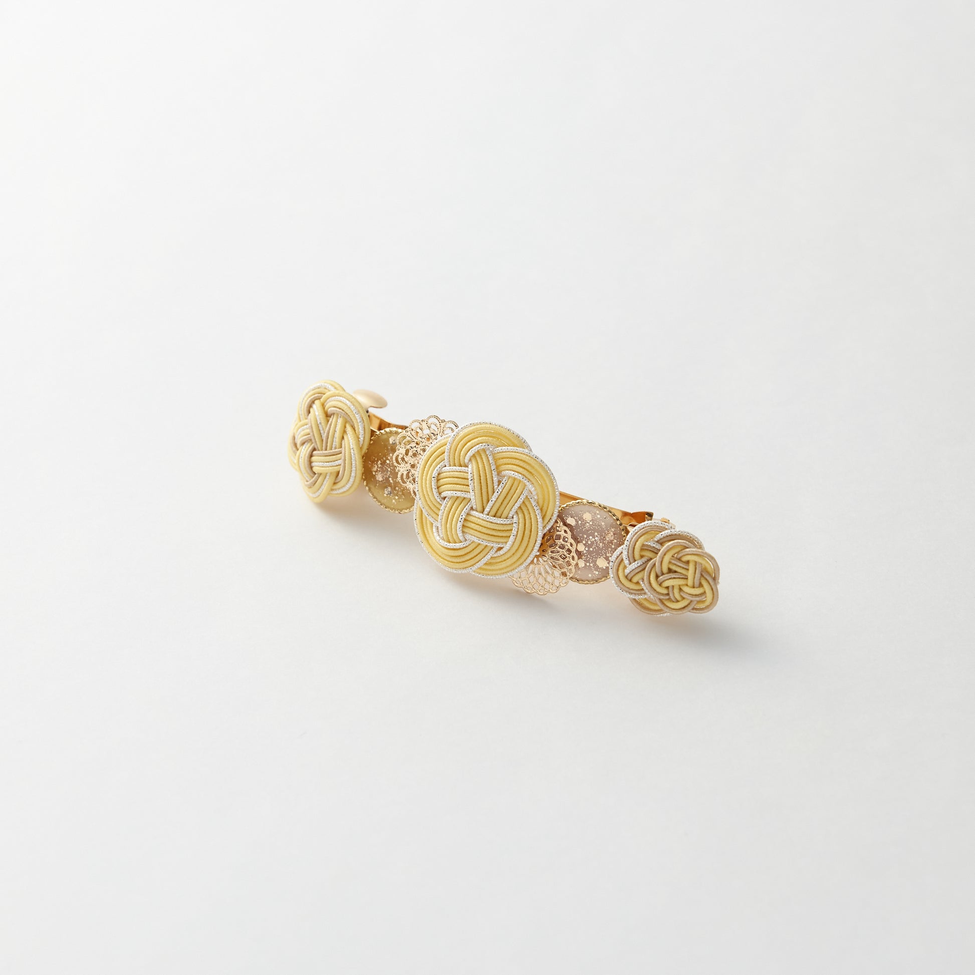 Japanese mizuhiki barrette with plum blossom design in yellow