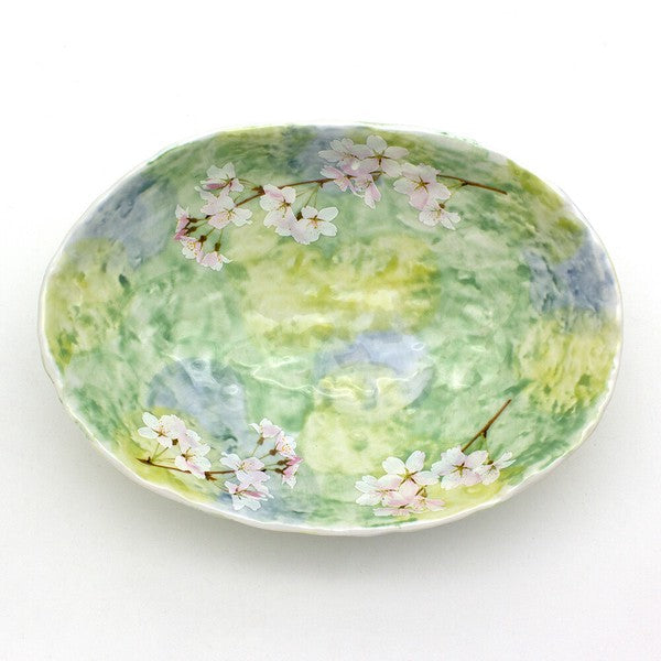 Top view of Green Sakura Blossom 21cm oval serving bowl showing cherry blossom pattern