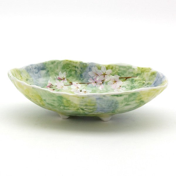 Side view of Green Sakura Blossom 21cm oval serving bowl showing shallow depth and elegant shape