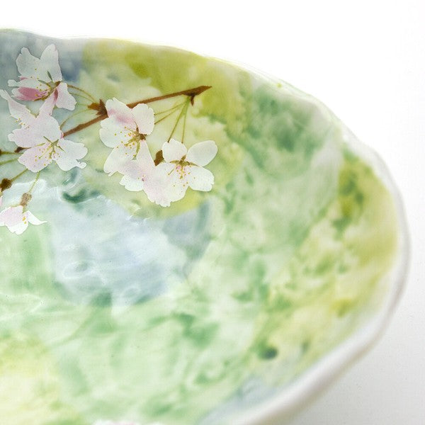 Close-up of delicate cherry blossom transfer print on Green Sakura Blossom Japanese serving bowl