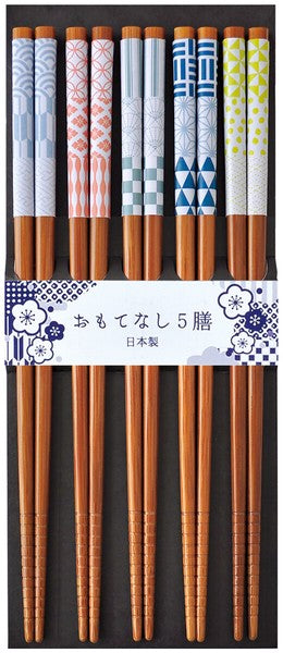 A set of natural bamboo chopsticks with various vibrant patterns, including floral and geometric designs