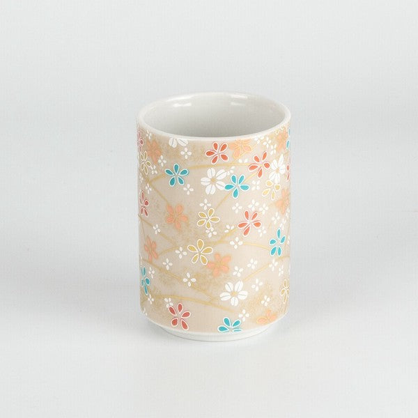 Hand-crafted Japanese tea cup with intricate botanical leaf design