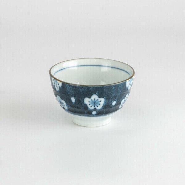 Front view of Mino Ware porcelain sencha teacup with floral indigo motif