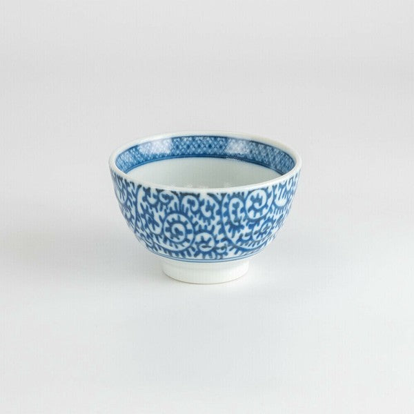 Front view of Mino Ware porcelain sencha teacup with intricate indigo arabesque pattern