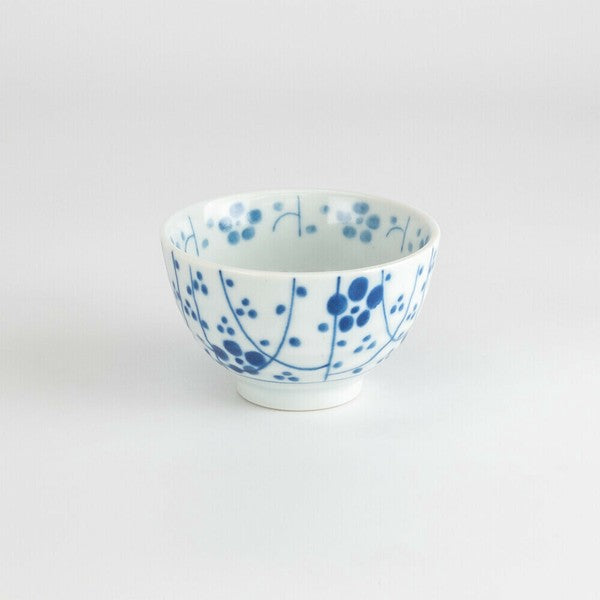 Front view of Mino Ware porcelain sencha teacup with indigo plum blossom motif