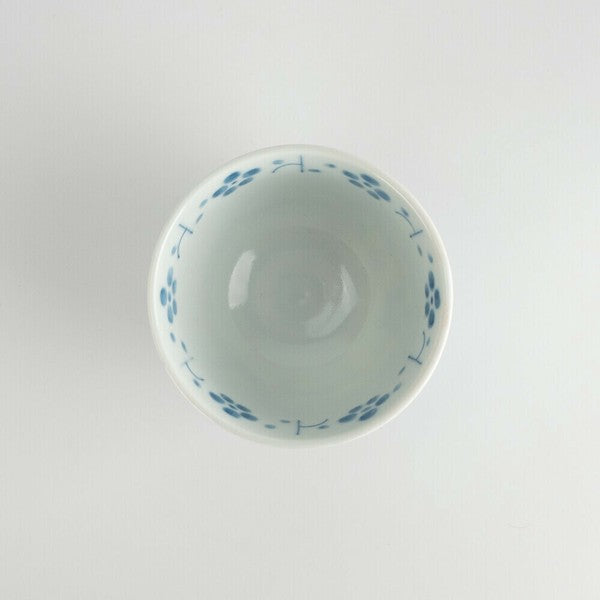 Top view of Mino Ware sencha cup with delicate indigo floral interior pattern