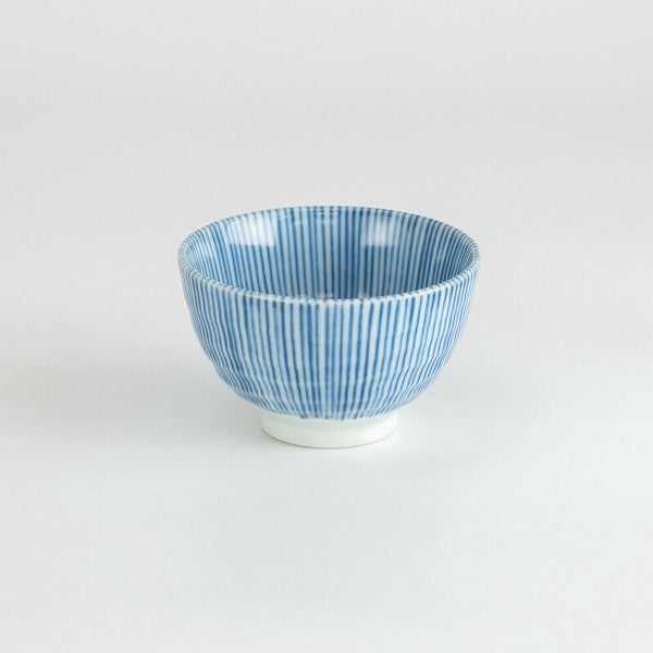 Front view of Mino Ware porcelain sencha teacup with fine vertical indigo stripes