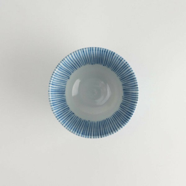 Top view of Mino Ware sencha cup with matching indigo stripe interior design