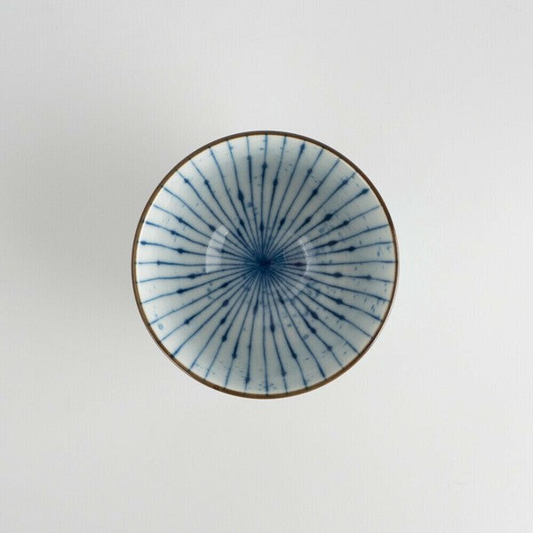 Top view of Mino Ware sencha cup with fine indigo vertical lines and brown-edged rim