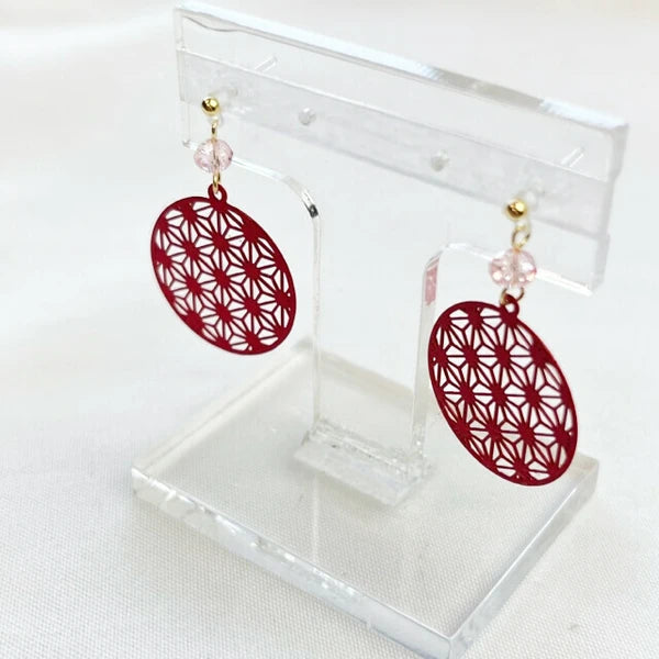 Side view of red geometric hemp leaf earrings with Japanese pattern
