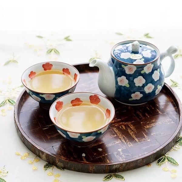 Arita Ware plum blossom bunny teapot and two tea cups displayed on a tray – tray not included