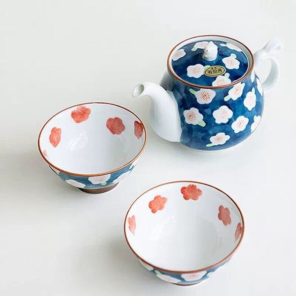 Arita Ware plum blossom tea cups paired with the matching bunny teapot