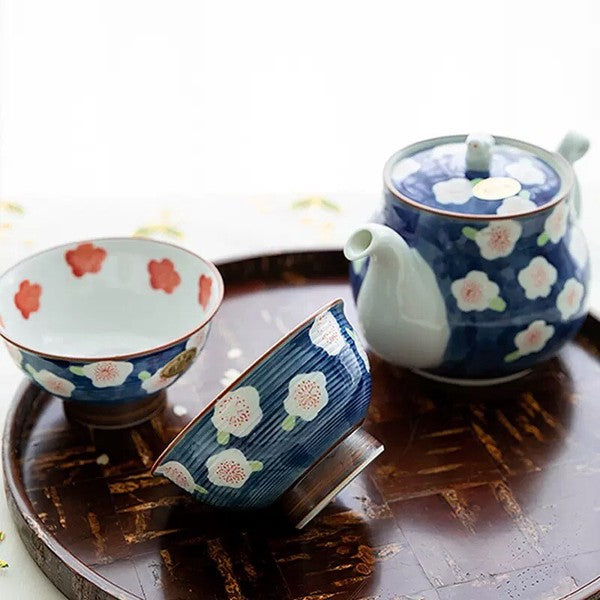 Arita Ware plum blossom bunny teapot with two matching Japanese tea cups