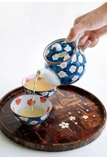 Arita Ware bunny teapot set with two matching tea cups filled with Japanese tea
