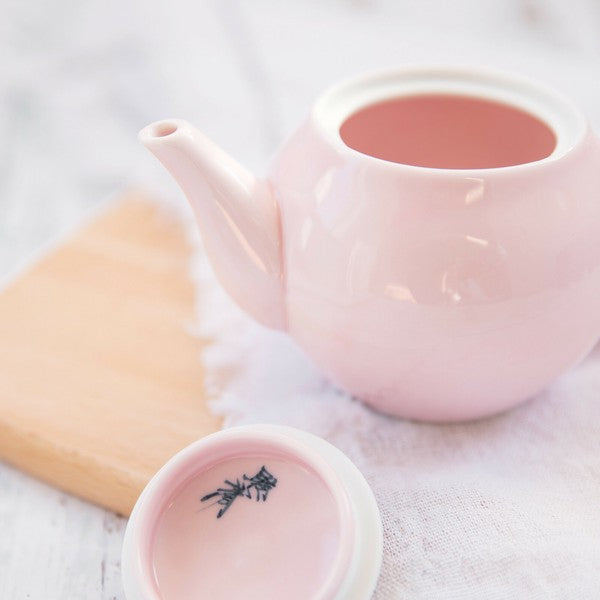 Soft pink Arita porcelain teapot with iridescent lid glaze