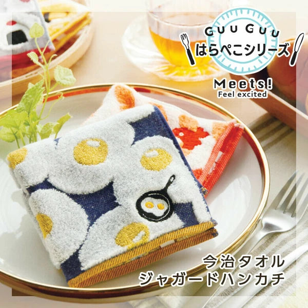 acquard towel handkerchief from the GuuGuu series with soft, fluffy texture and playful design, displayed flat