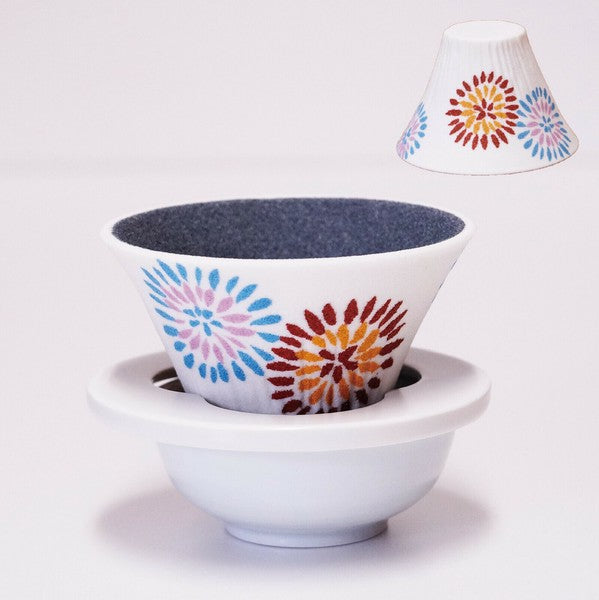 Close-up of summer fireworks motif on ceramic coffee dripper inspired by Mt. Fuji