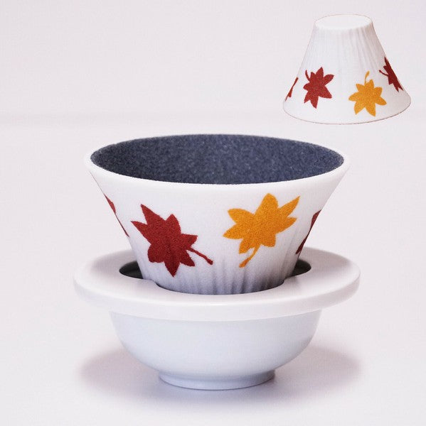 Close-up of Autumn leaves motif on ceramic coffee dripper inspired by Mt. Fuji