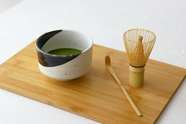 Matcha set with Mino ware bowl, bamboo whisk, and scoop on wooden board – Oribe Style