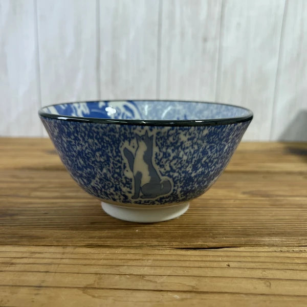 Side angle of Shiba Inu x Great Wave ceramic bowl highlighting playful shiba