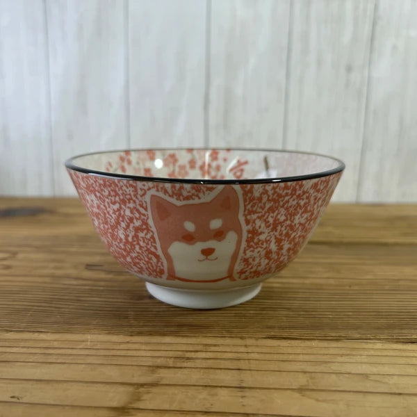 Side view of Shiba Inu x Kyoto Mino ware bowl with playful Shiba Inu 
