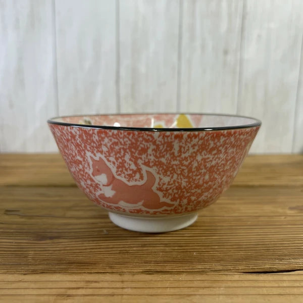 Side view of Shiba Inu x Kyoto Mino ware bowl with playful Shiba Inu 