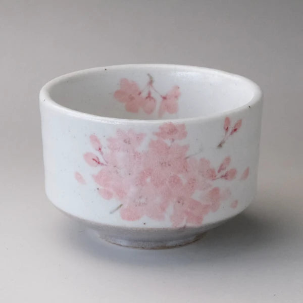 Sakura Kanzashi matcha bowl in Mino ware with soft pink cherry blossom design on white glaze