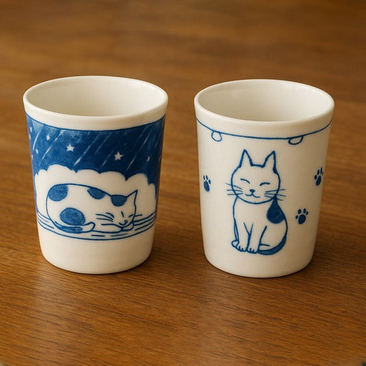Japanese ceramic cat teacups with hand-drawn illustrations