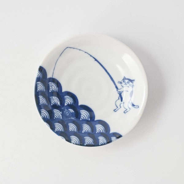 Japanese porcelain Some-neko small plate featuring playful cat illustration in blue glaze
