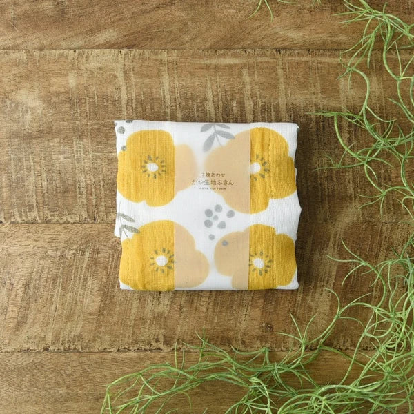 Folded yellow floral 7-layer kaya fabric cleaning cloth