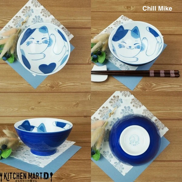 Multi-angle views of the Chill Mike cat bowl—showing the playful cat design from top, side, and bottom perspectives in vivid blue.