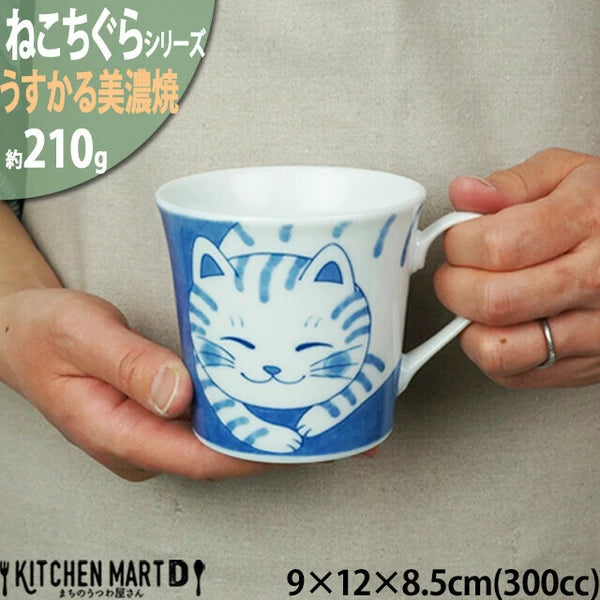 Striped Tora calm cat artwork on Japanese Mino ware mug