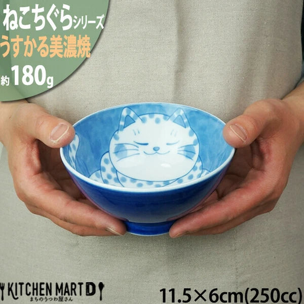 Nekochigura cat bowl with sleepy Buchi illustration in traditional Japanese blue on white base